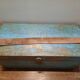 Antique wooden trunk with blue patina