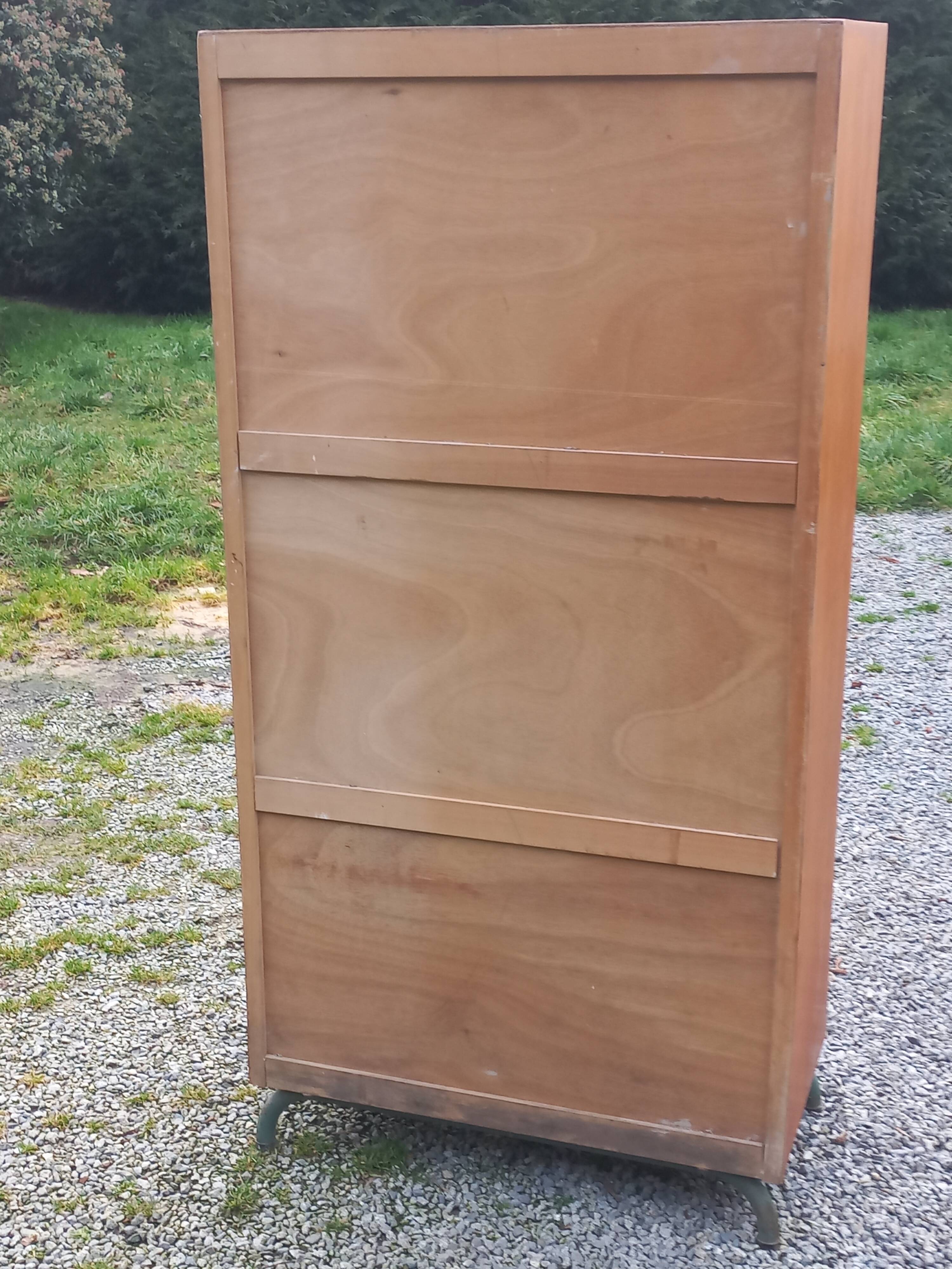 Vintage oak wardrobe with metal legs from the 1950s.