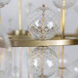 Large chandelier in gilded brass with decorative balls. 1970s.