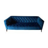 Royal blue velvet upholstered sofa