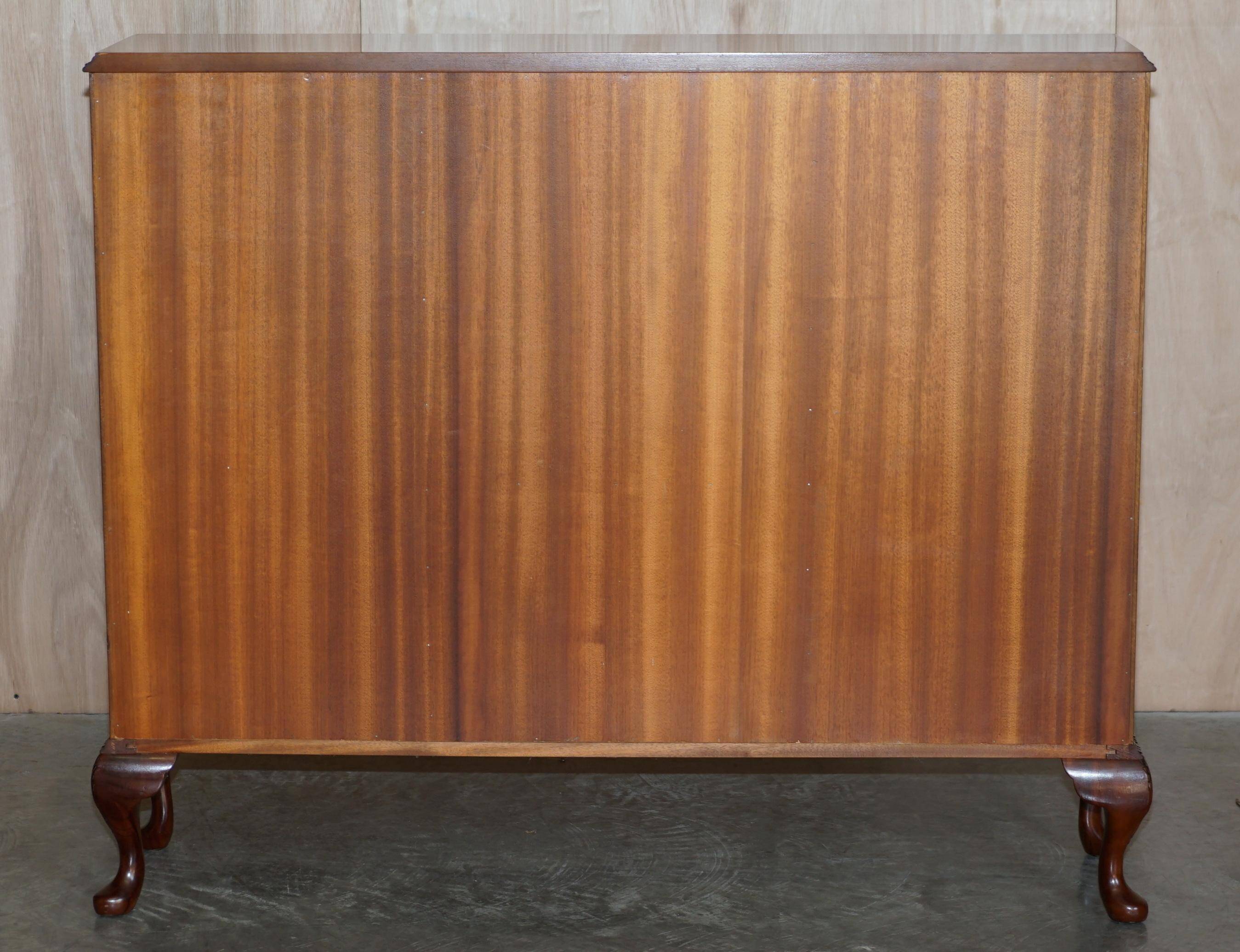Vintage buffet display cabinet circa 1940 in flame mahogany and satinwood.