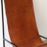 Pair of vintage armchairs in stretched leather and metal structure