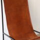 Pair of vintage armchairs in stretched leather and metal structure