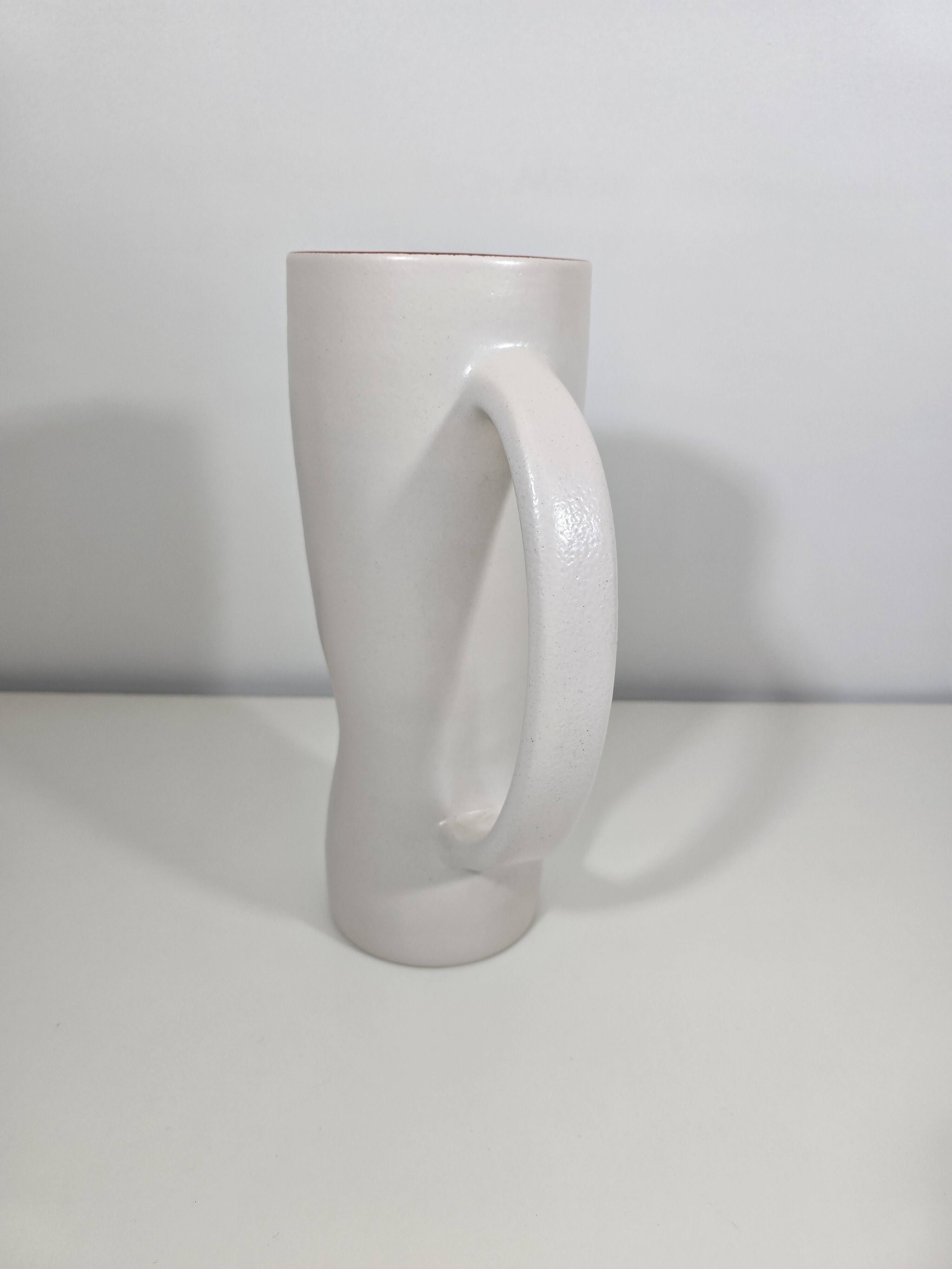 Jug and 12 ceramic cups model 1059 by Pol Chambost from around 1950.
