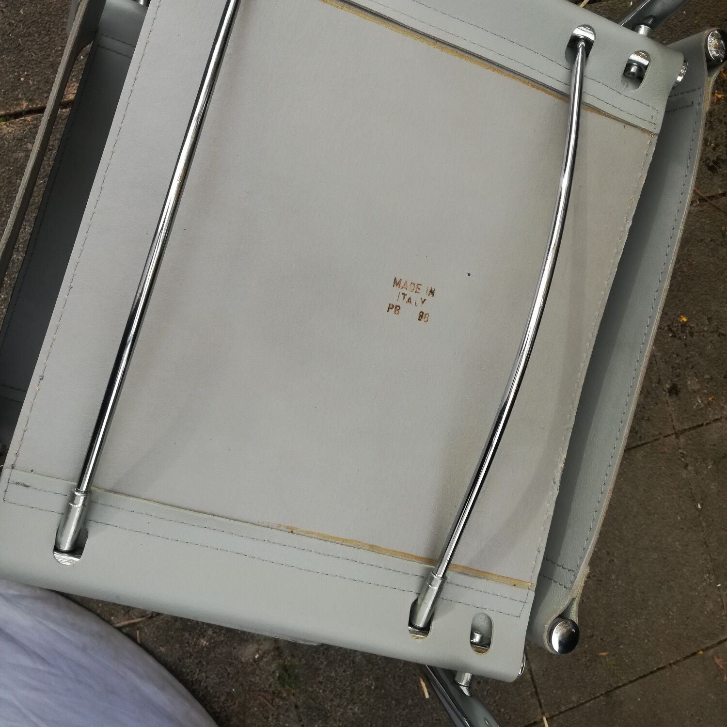 Pair of cantilever armchairs in grey leather made in italy