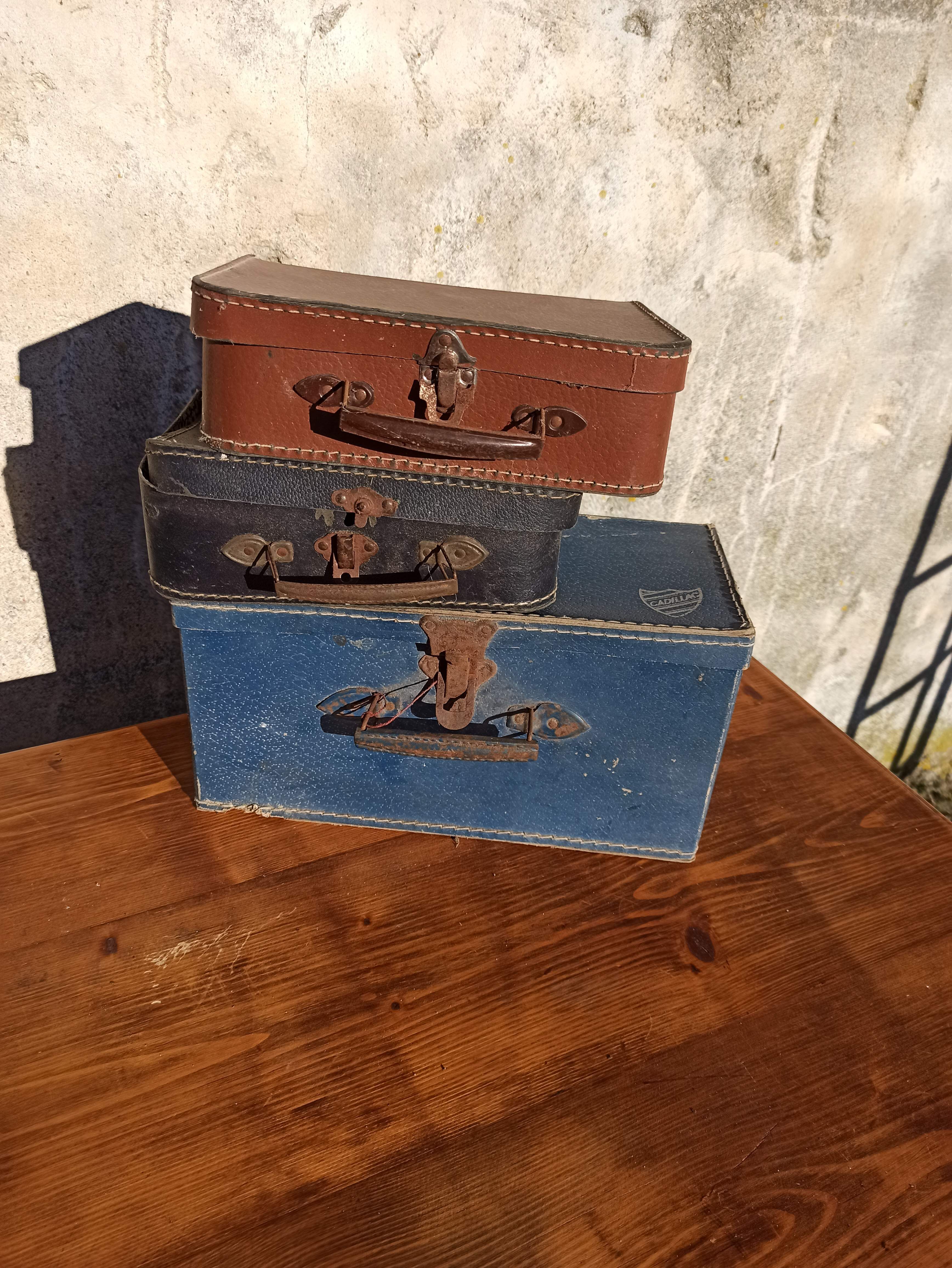 Set of 3 old cardboard suitcases