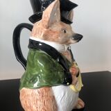 Ceramic jug representing a fox in hunting attire date 1986