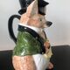 Ceramic jug representing a fox in hunting attire date 1986