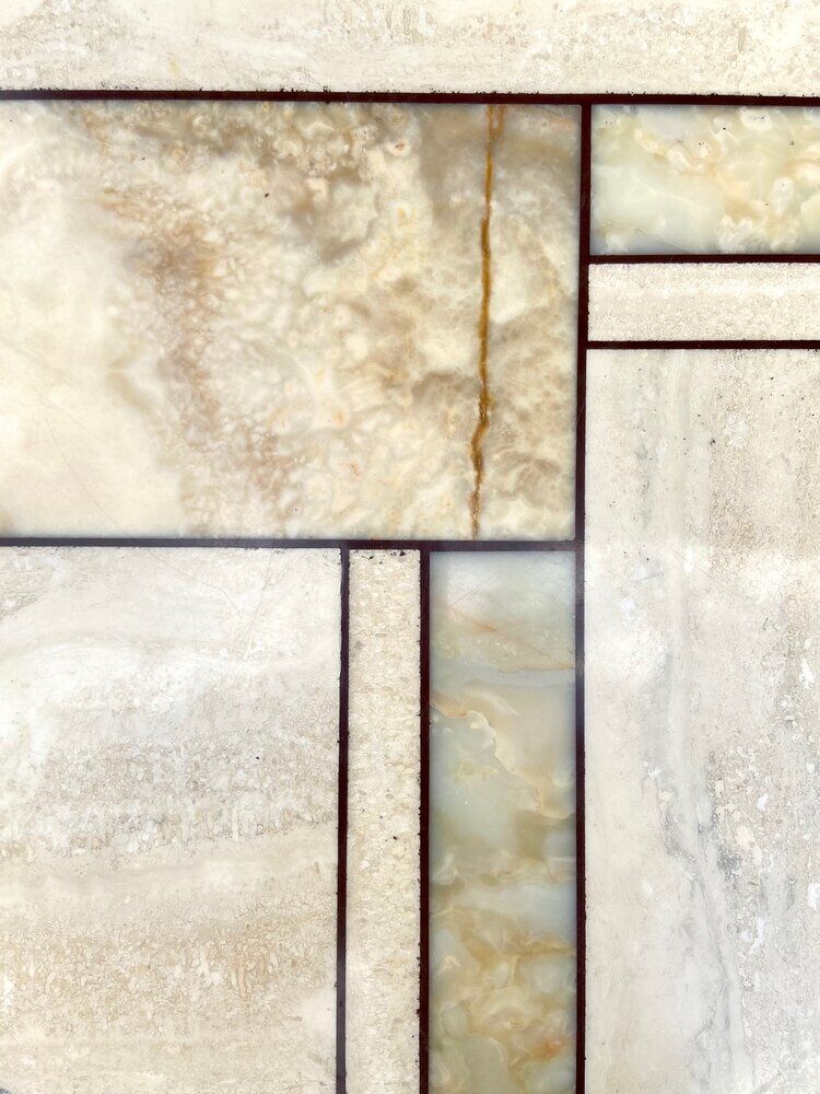 Low table in travertine and onyx 80'