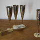 5 metal and brass champagne flutes
