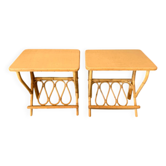 A pair of rattan bedside tables.