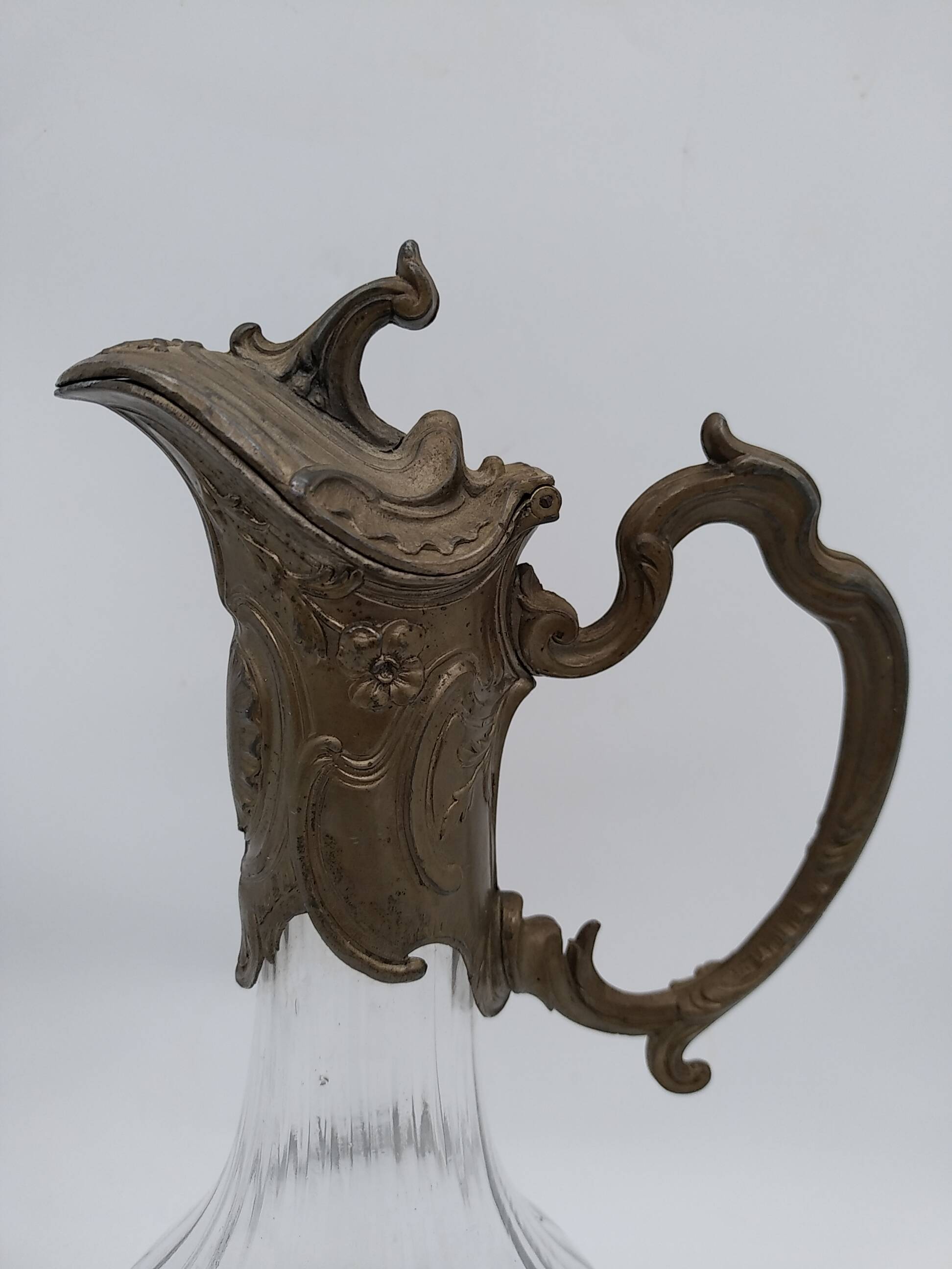 Large balloon glass carafe with pewter frame.