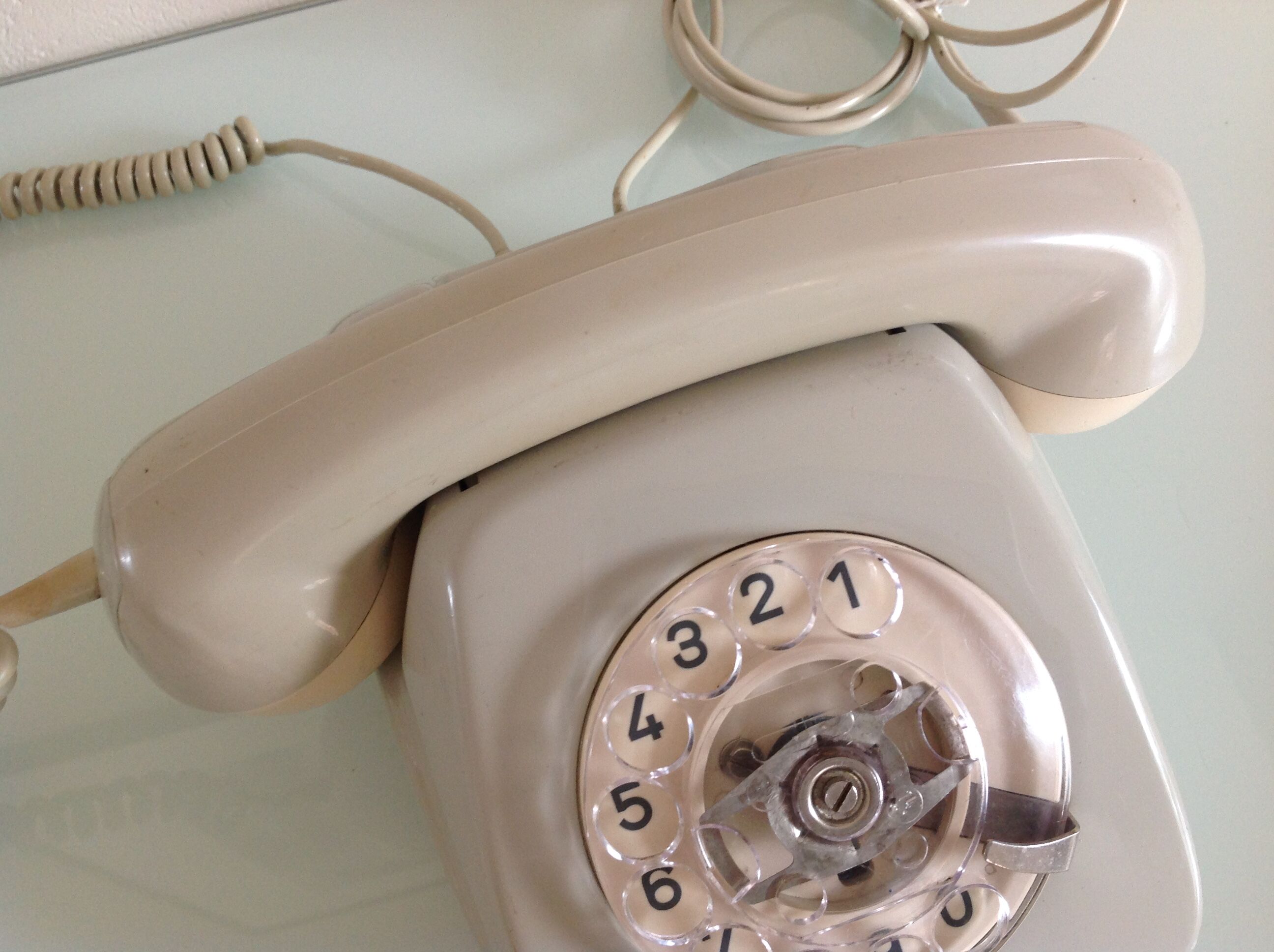 Vintage gray and beige rotary phone