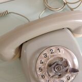 Vintage gray and beige rotary phone