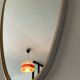 Asymmetrical mirror Deknudt from the 60s