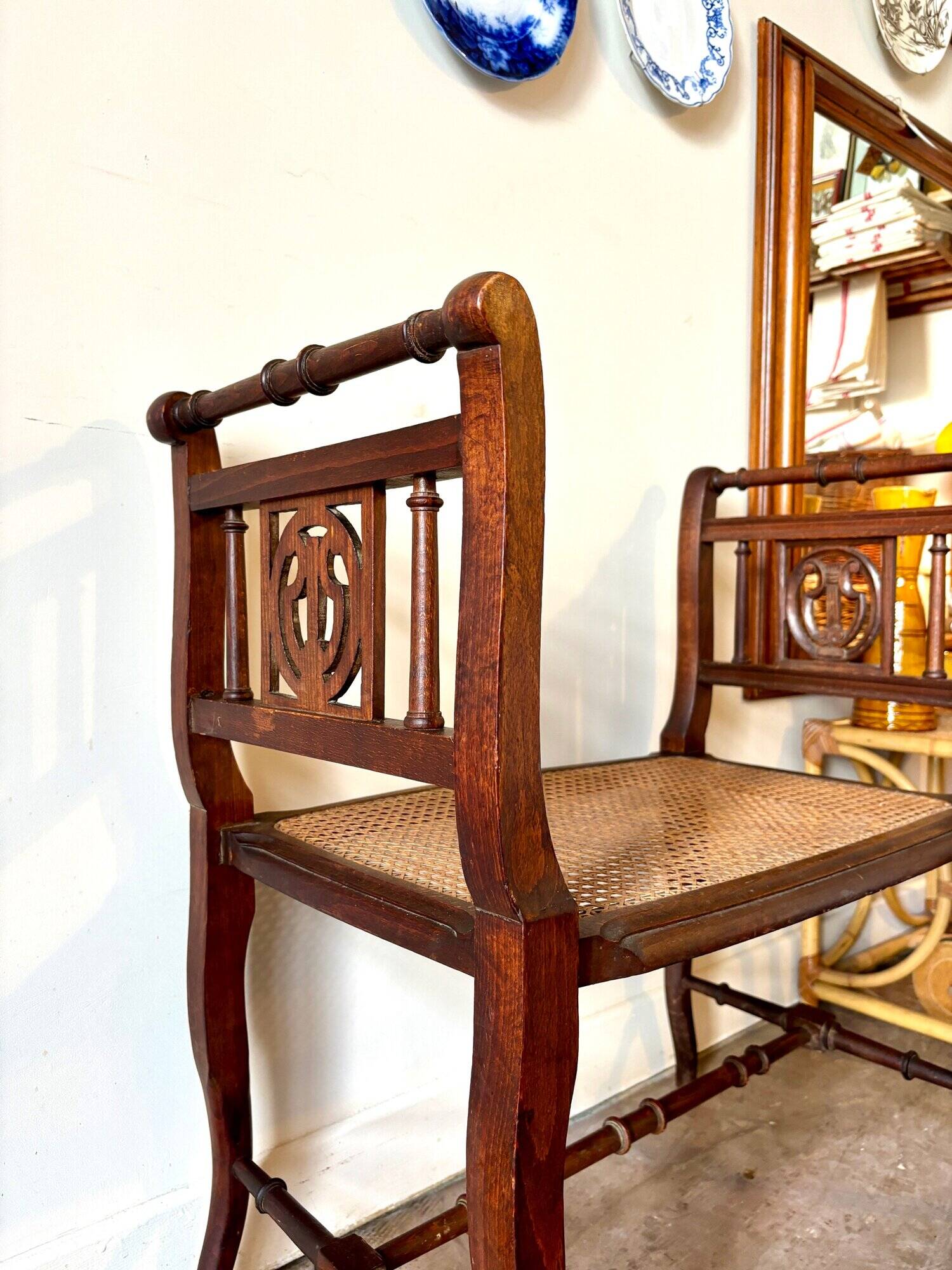 Dark wood and cane bench