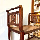 Dark wood and cane bench