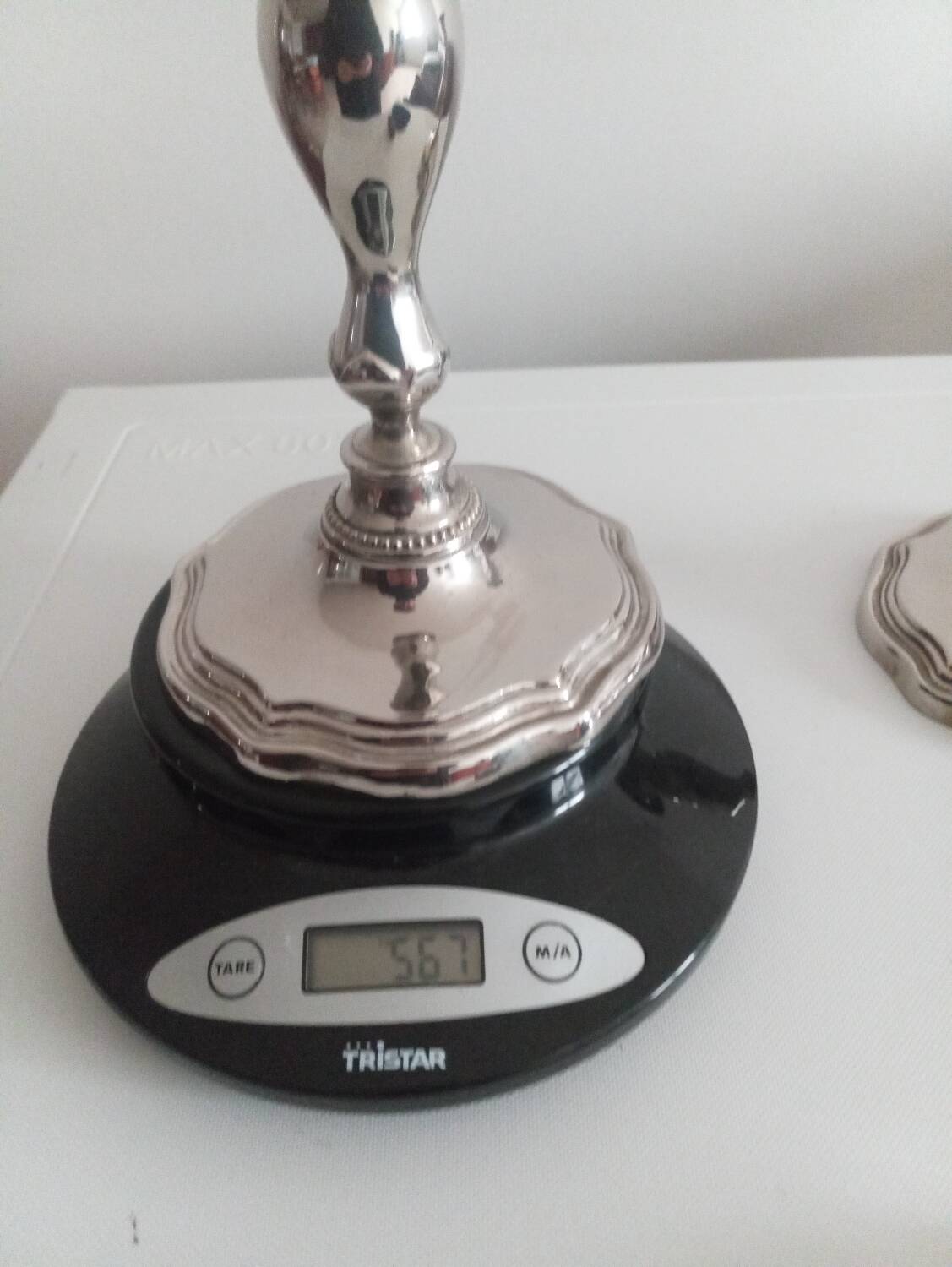 Pair of silver-plated metal candlesticks