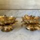 Lotus brass candlestick pair