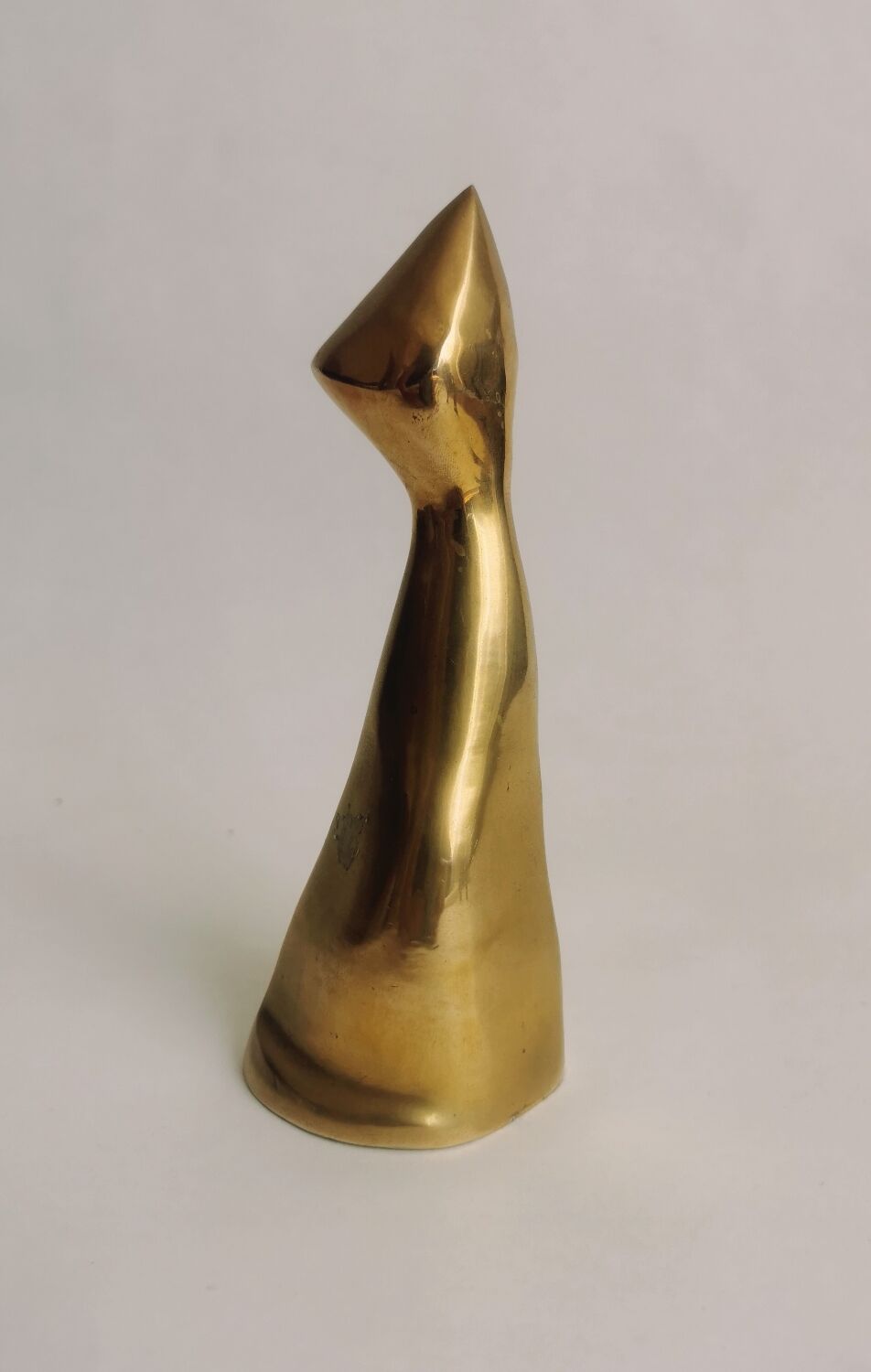 Trio of cats in gilded brass