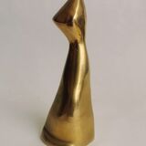 Trio of cats in gilded brass