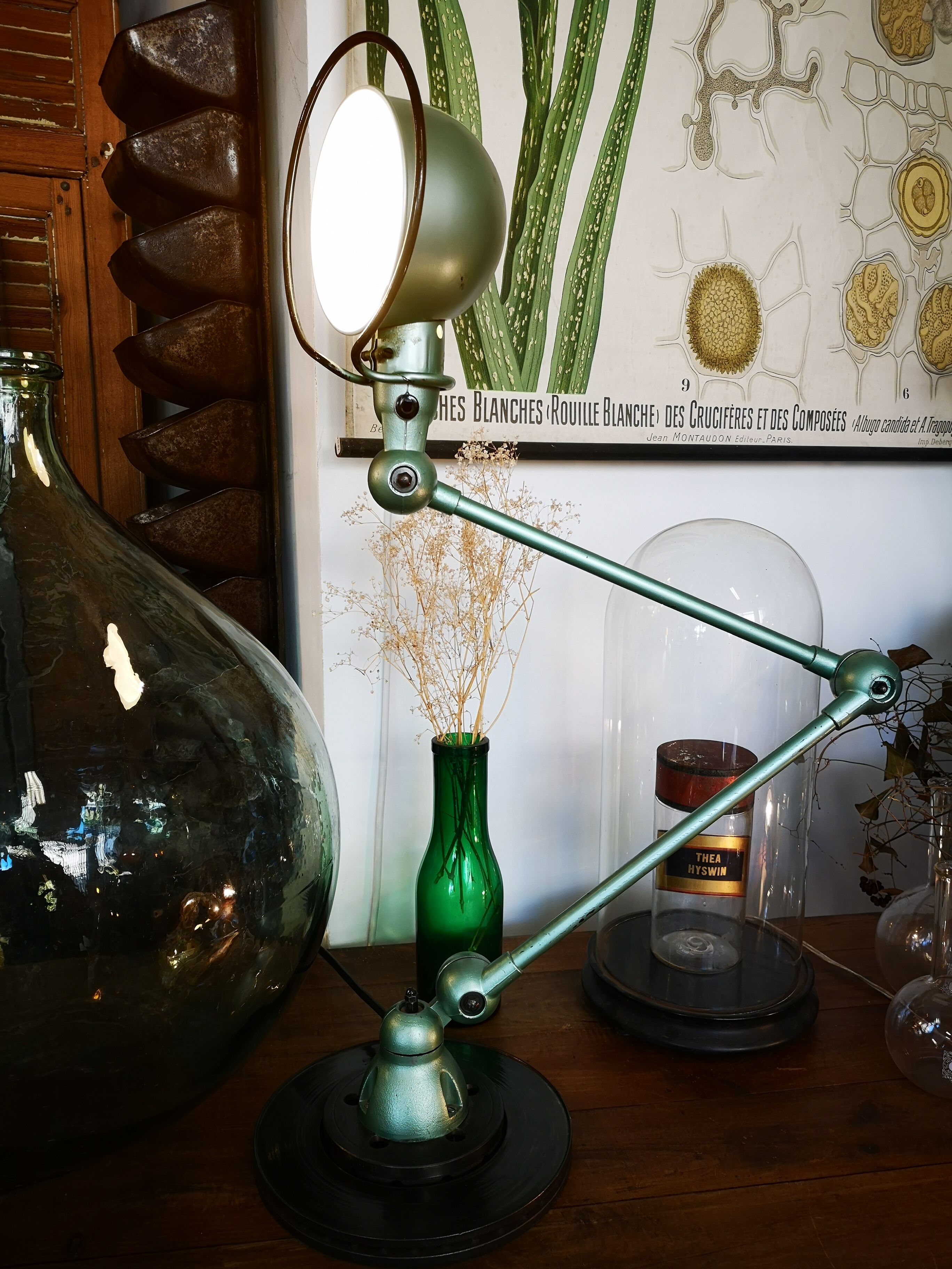 Old green metallic Jieldé lamp