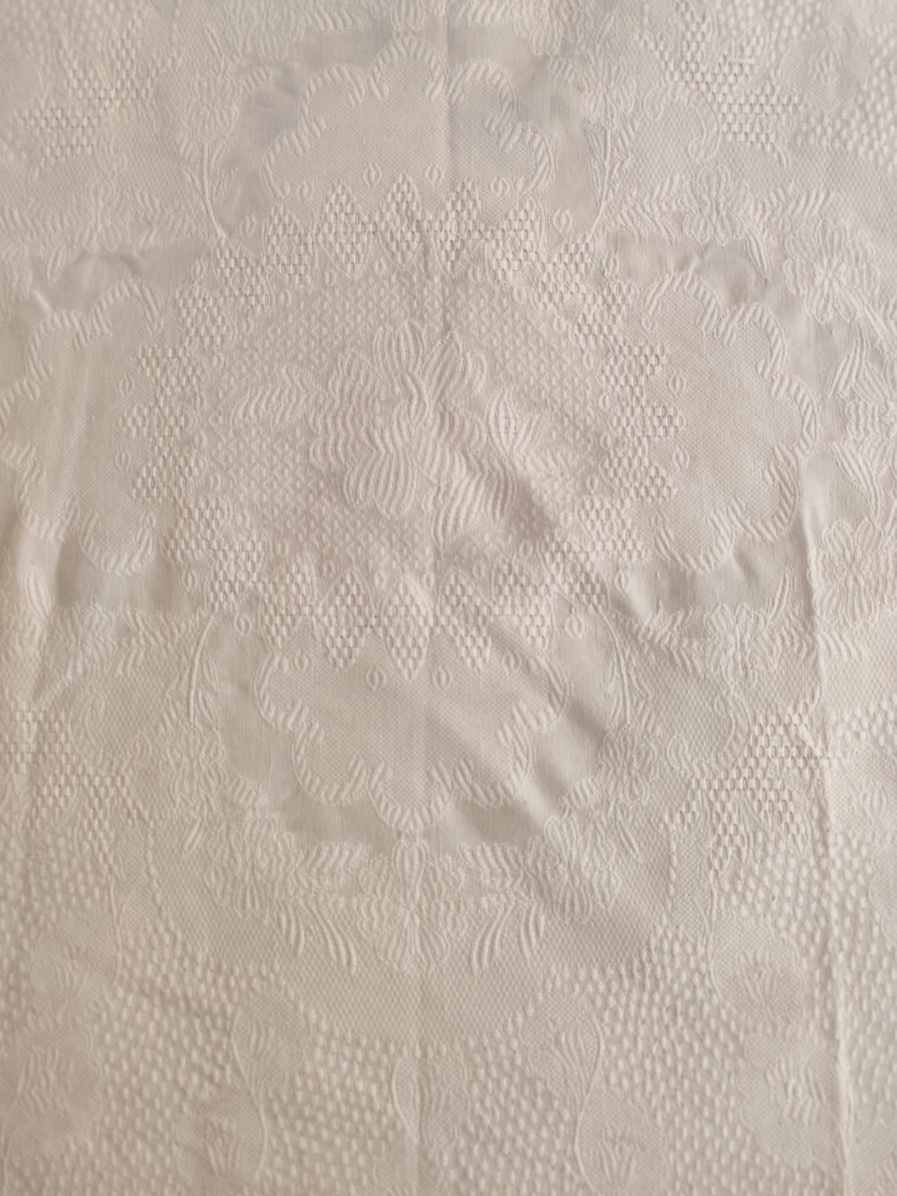 White woven cotton bedspread with fringes