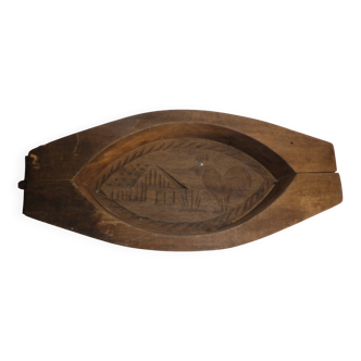 old wooden butter mold