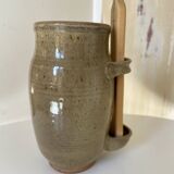 Old varnished stoneware pickle pot with tongs