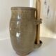 Old varnished stoneware pickle pot with tongs