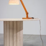 Circular modernist dining table in travertine 1970