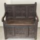 Chest bench in natural wood carved with Gothic motifs