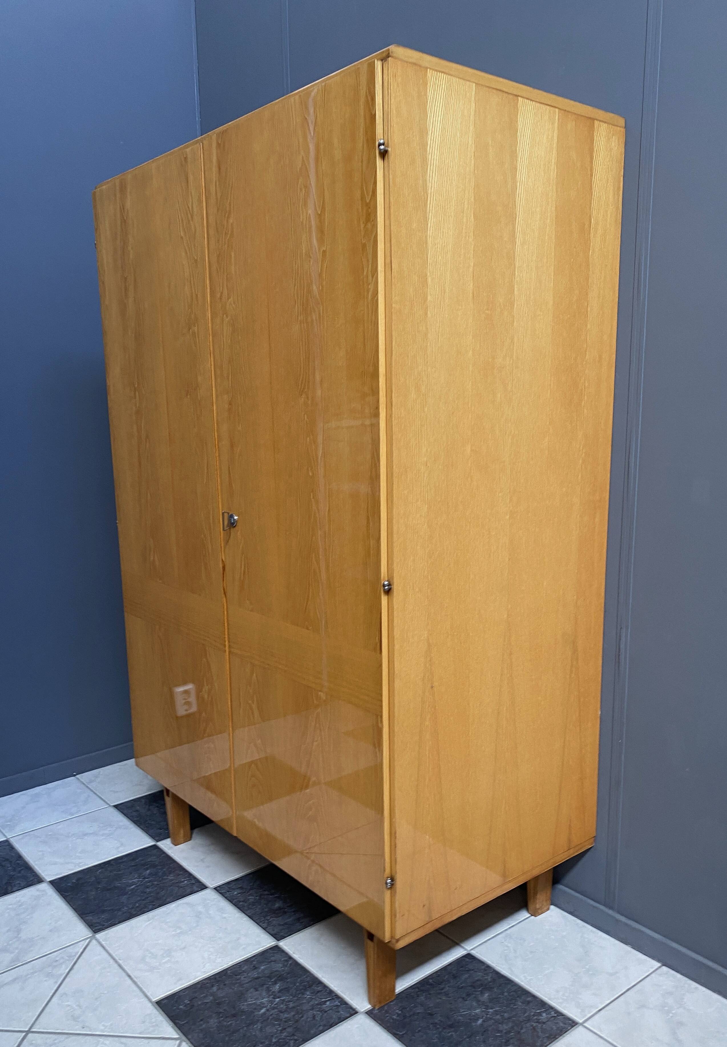 All shelf wardrobe cabinet in ash wood by františek mezulánik  for novy domov