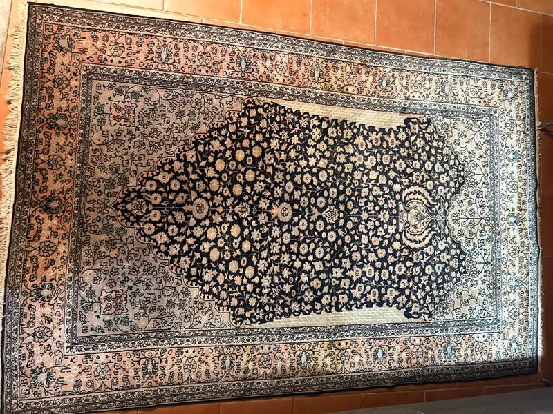 Large blue Persian carpet