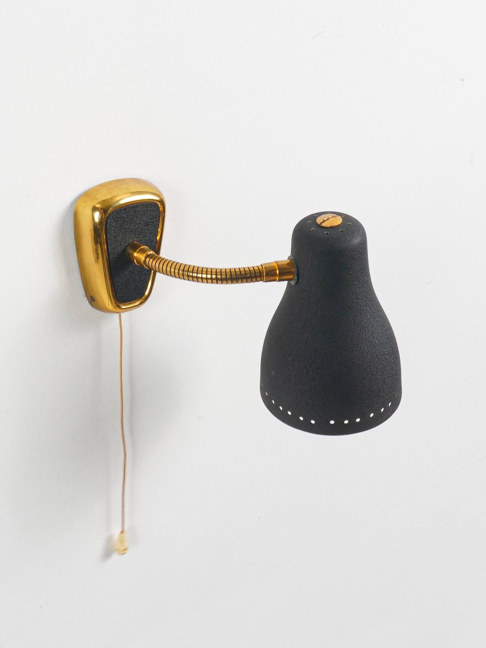 Jacques biny (designer) - pair of adjustable wall lights in brass & metal