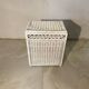 White rattan bedroom set: chest of drawers, mirror, bed, basket