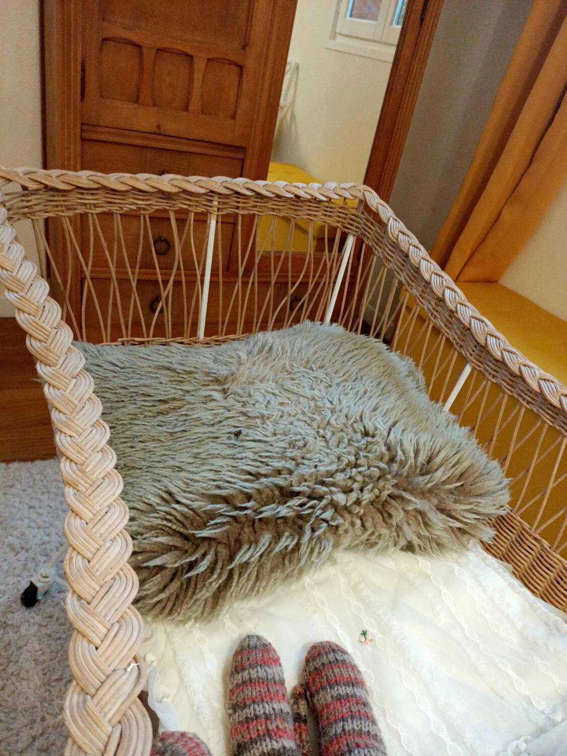 Rattan and wrought iron cradle