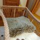 Rattan and wrought iron cradle