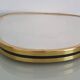 Vintage ovoid mirror with gold and black edges - 1960s