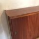 Vintage storage cabinet teak veneer sliding door compass feet