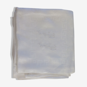 Lot de 8 serviettes damassées avec monogrammes.