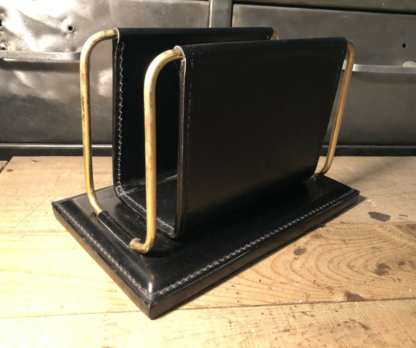 Vintage leather and brass office mail holder