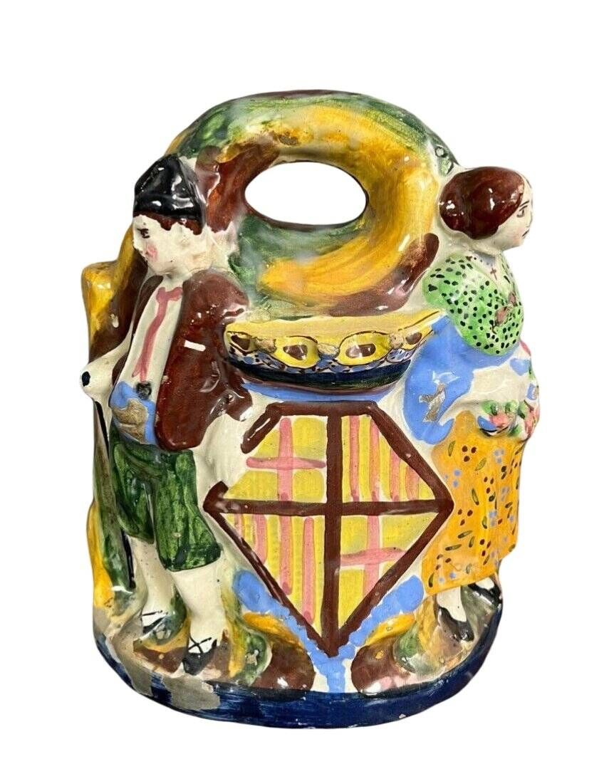 Sculpture in Spanish Majolica representing the Black Virgin with Child.