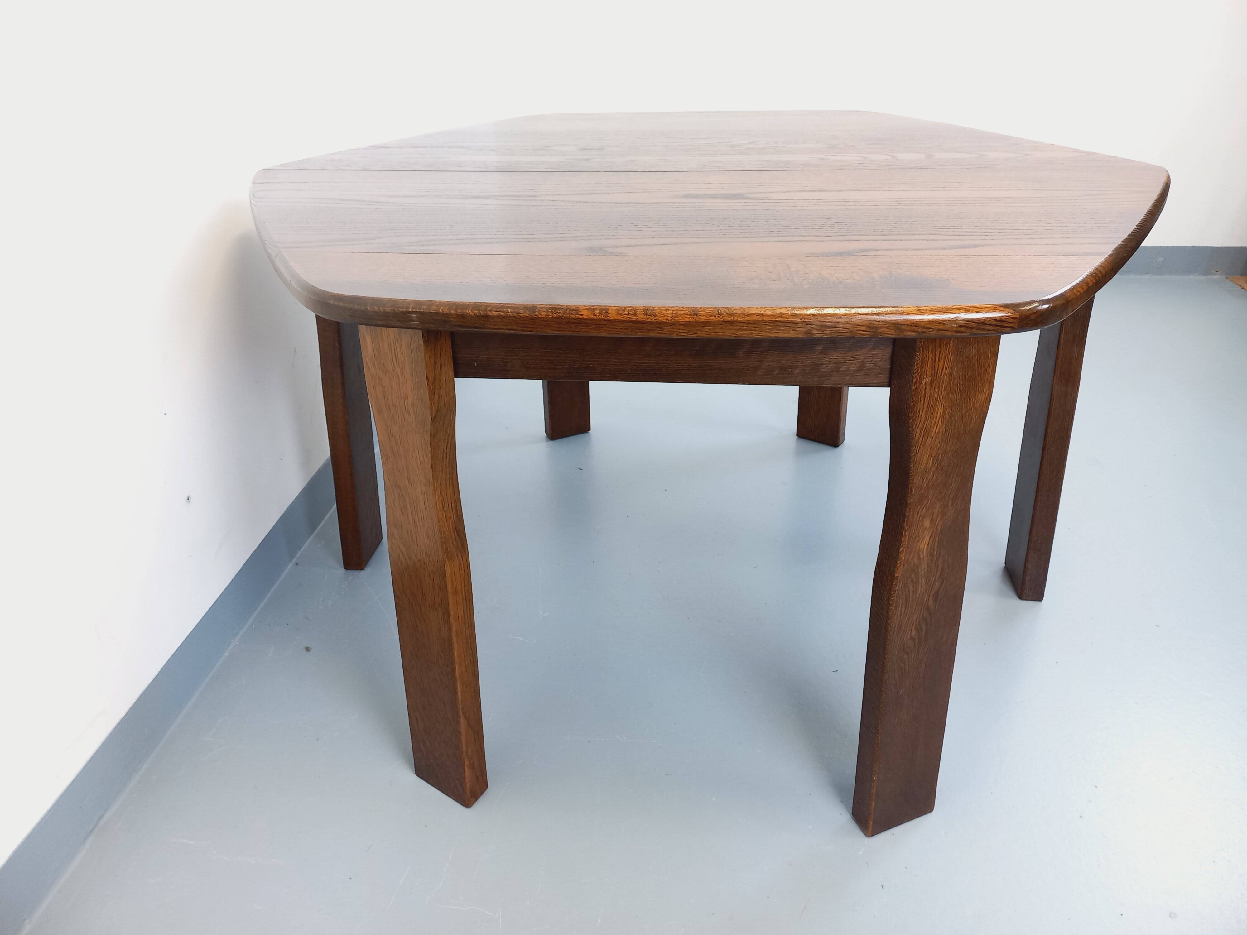 Vintage brutalist hexagonal dining table made of oak from the 1950s.