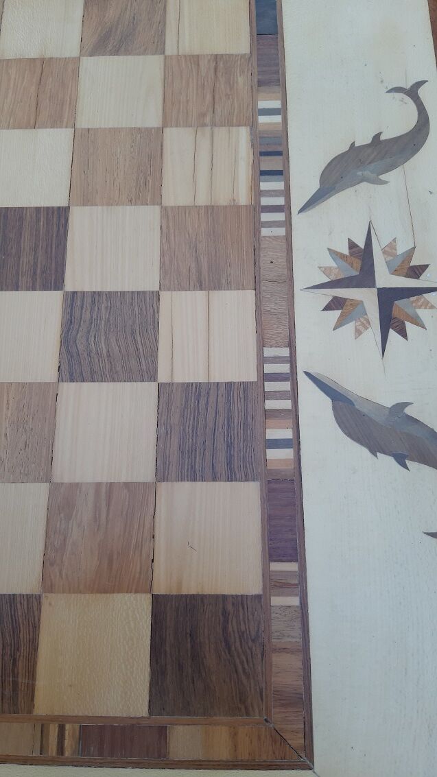 Table at play marquetry