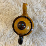 Teapot in yellow ceramic with the logo