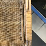 Old wicker rattan armchair