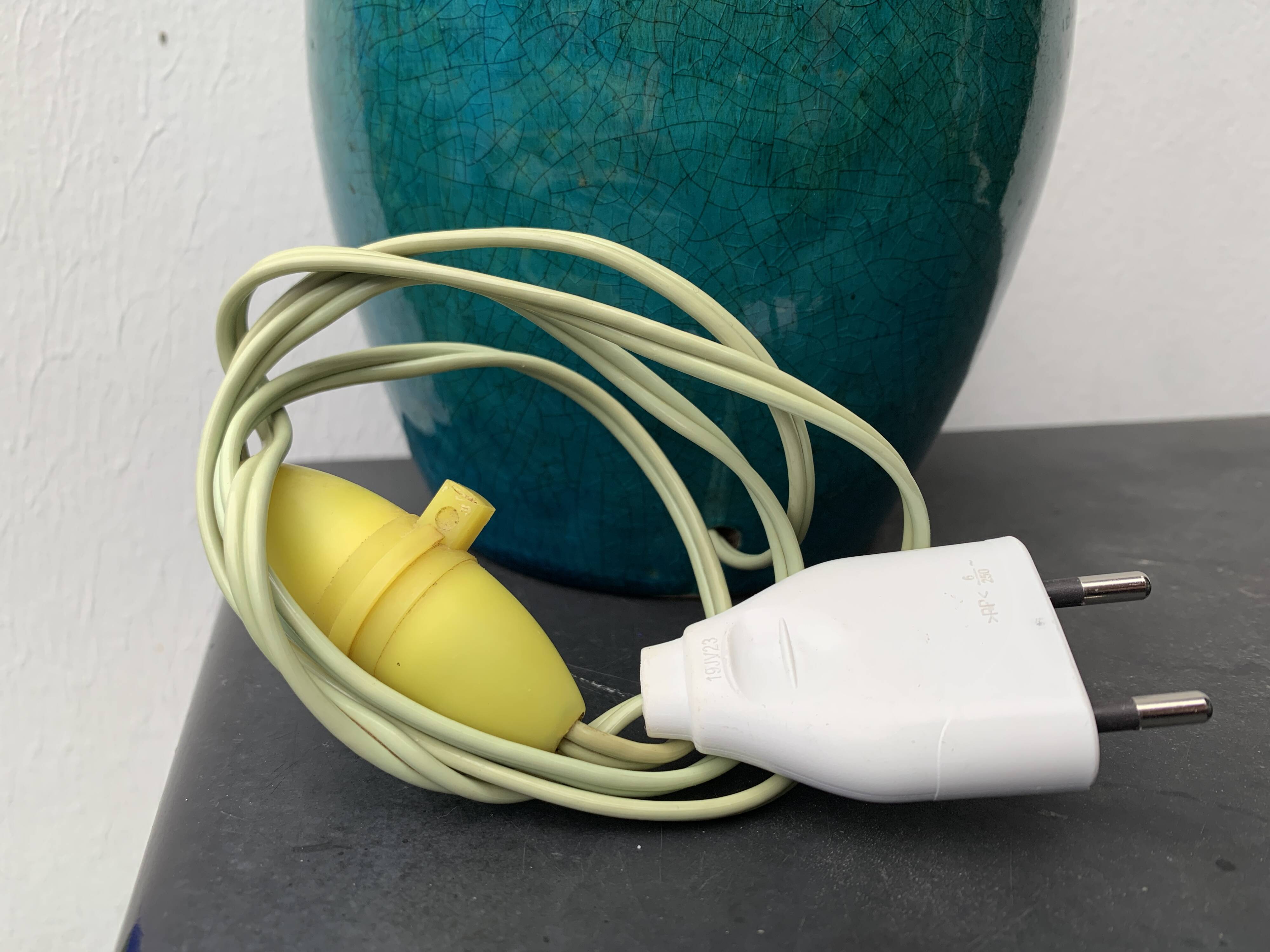 Cracked and signed ceramic ball lamp base, blue-green tones