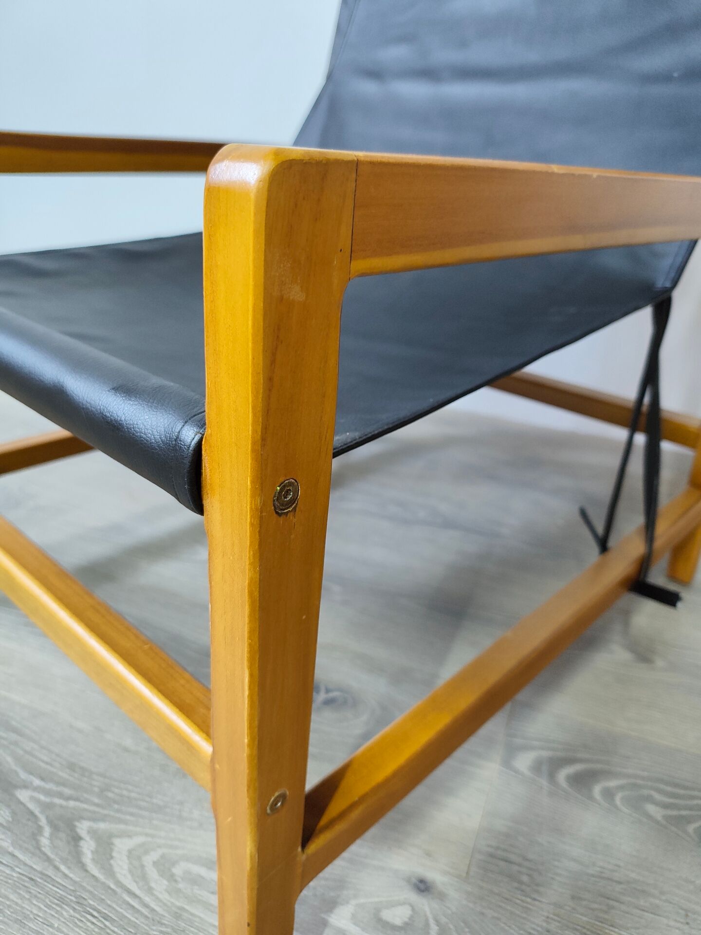 Leather and teak armchair