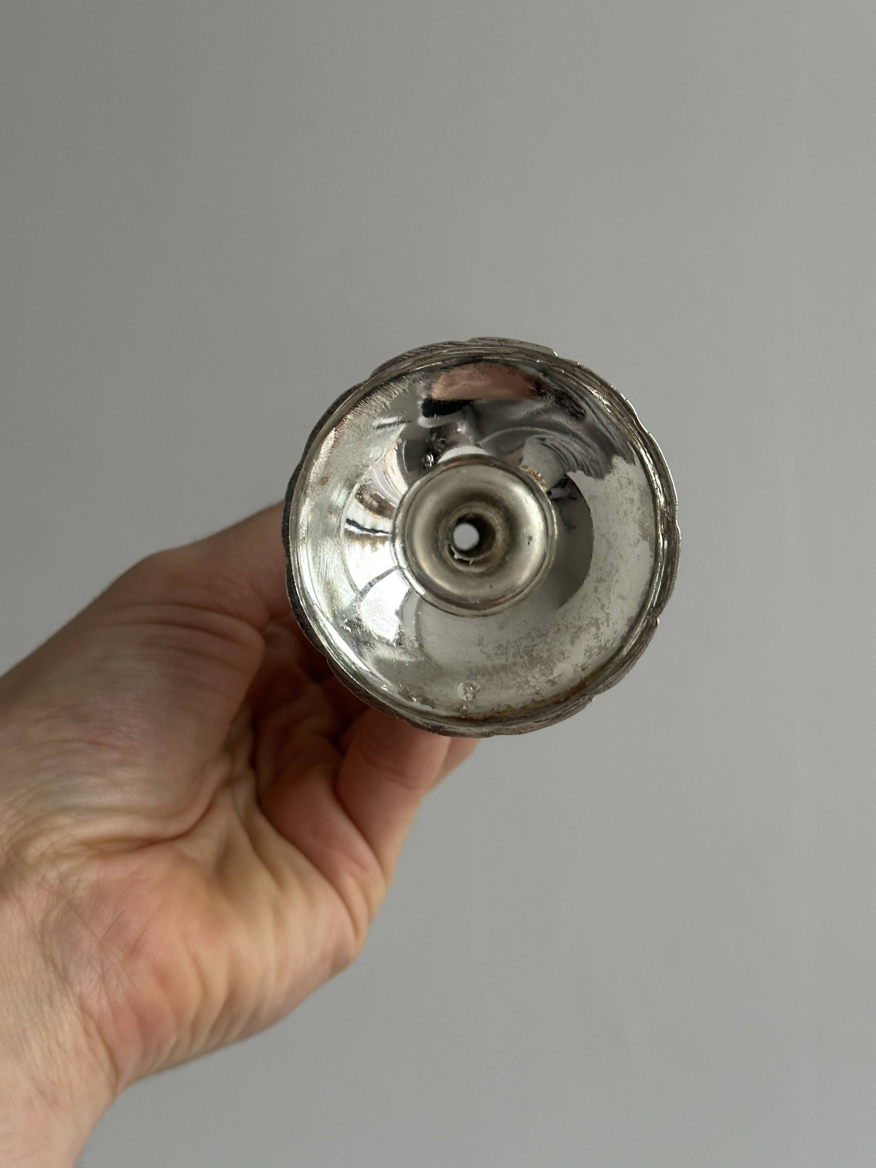 slender chrome metal candlestick